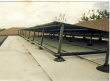 Solar pool heating system by AEP solar - Sealed Air framed panels - tilt mounted